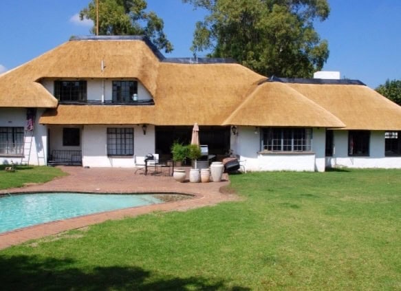 Premium thatch roof on a family home